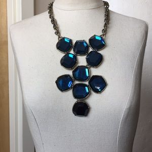 Antiqued gold and reflective blue Chico’s necklace